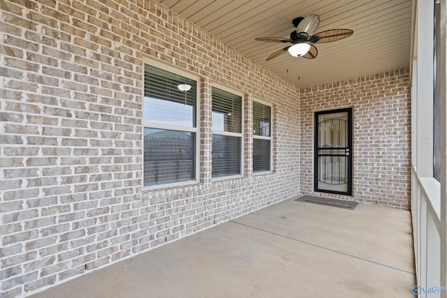 view of patio featuring ceiling fan