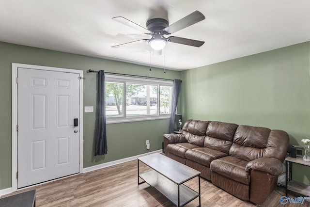1101 5th Ave SW, Decatur, AL 35601 - living room with ceiling fan, wood finished floors, and baseboards