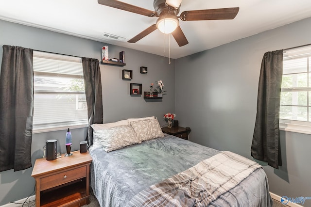 1101 5th Ave SW, Decatur, AL 35601 - bedroom with ceiling fan and baseboards