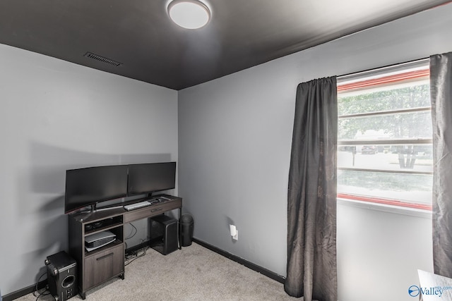1101 5th Ave SW, Decatur, AL 35601 - home office featuring light colored carpet and baseboards