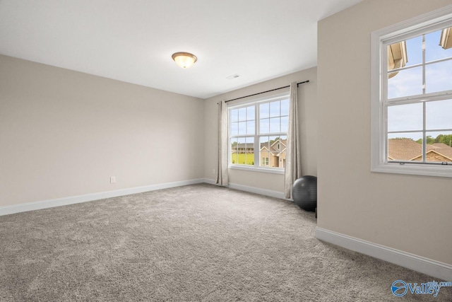 140 Amelia Dr, Harvest, AL 35749 - spare room featuring carpet flooring and baseboards