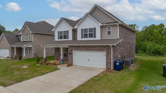 140 Amelia Dr, Harvest, AL 35749 - view of front of home featuring an attached garage, concrete driveway, brick siding, and a front lawn