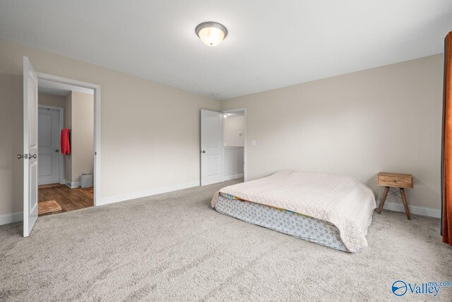 140 Amelia Dr, Harvest, AL 35749 - carpeted bedroom with baseboards