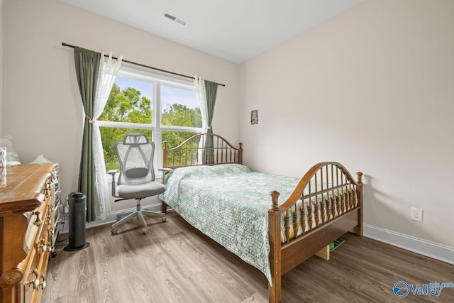140 Amelia Dr, Harvest, AL 35749 - bedroom featuring wood finished floors and baseboards