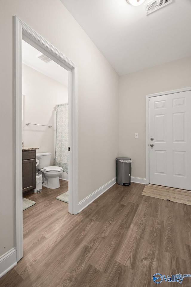 140 Amelia Dr, Harvest, AL 35749 - foyer entrance with wood finished floors and baseboards