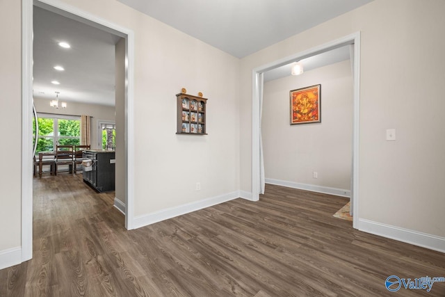 140 Amelia Dr, Harvest, AL 35749 - corridor with dark wood-type flooring, baseboards, a chandelier, and recessed lighting