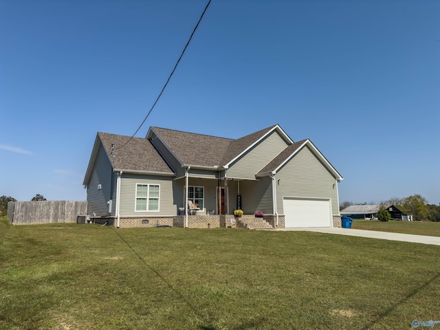 view of front of property with a garage, a porch, and a front lawn