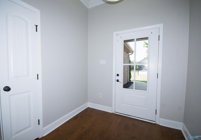 entryway with dark hardwood / wood-style flooring