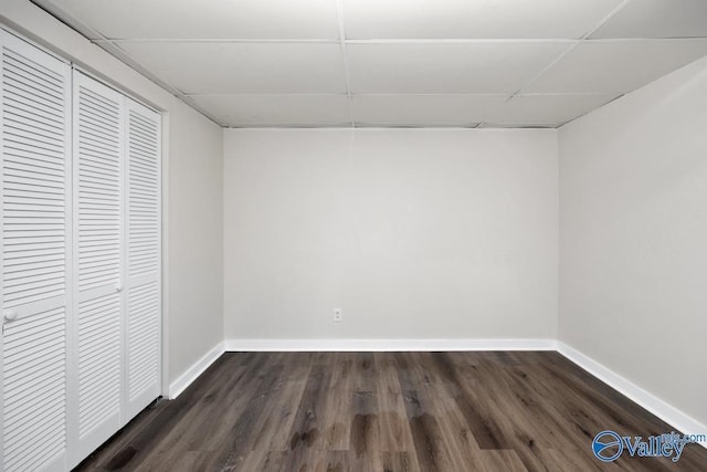 interior space with a closet and dark hardwood / wood-style floors