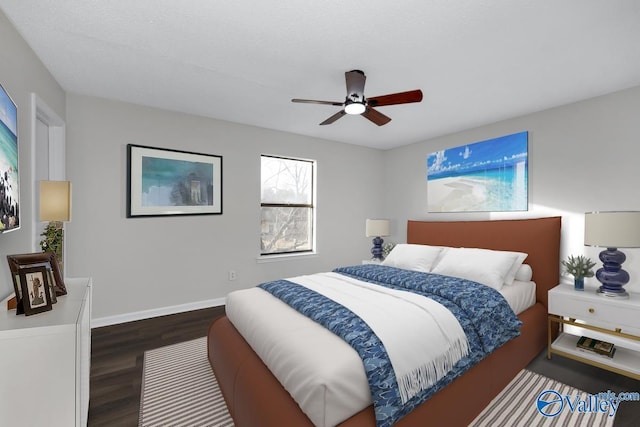 bedroom featuring ceiling fan and dark hardwood / wood-style floors