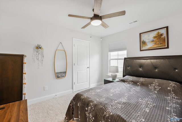 221 Alonzo Toney Dr, Madison, AL 35756 - carpeted bedroom with baseboards and ceiling fan