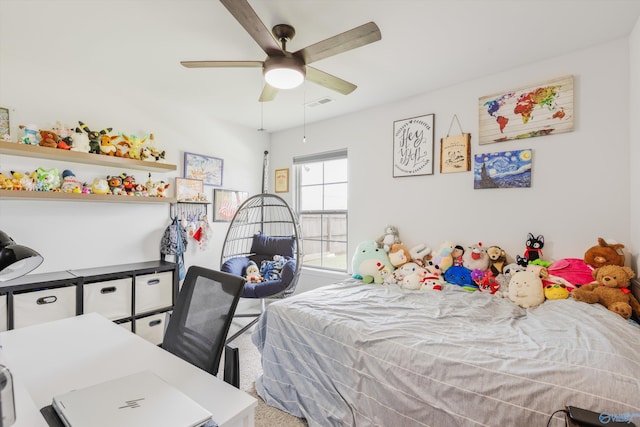 221 Alonzo Toney Dr, Madison, AL 35756 - carpeted bedroom with an office area and a ceiling fan