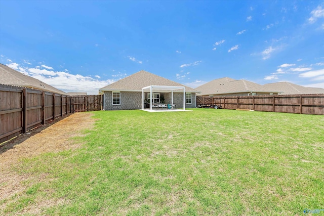 221 Alonzo Toney Dr, Madison, AL 35756 - rear view of house with a patio area and brick siding