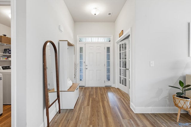 221 Alonzo Toney Dr, Madison, AL 35756 - foyer entrance featuring wood finished floors and baseboards
