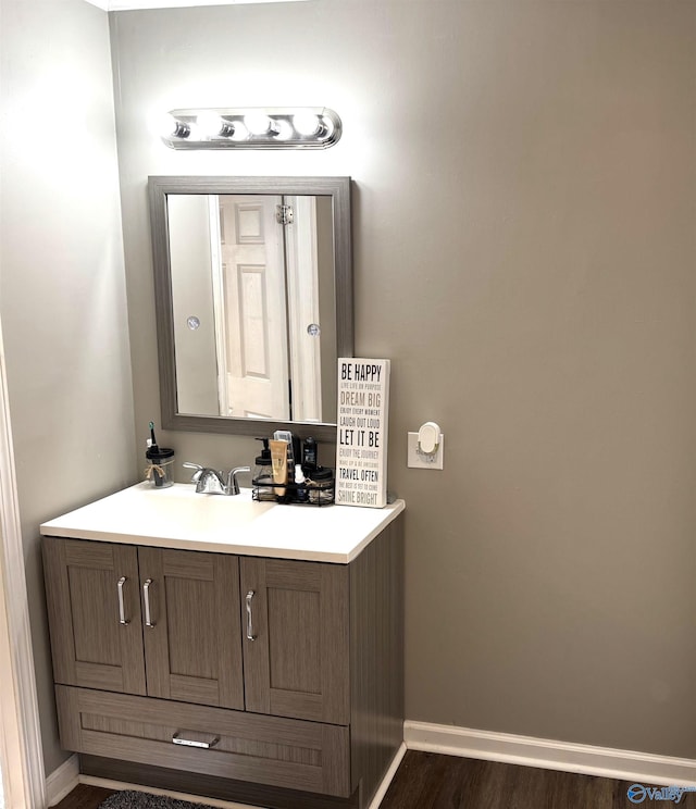 205 Pine Rd, Gadsden, AL 35901 - bathroom with baseboards, vanity, and wood finished floors