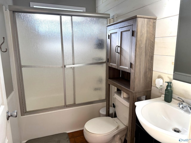 205 Pine Rd, Gadsden, AL 35901 - bathroom featuring vanity, bath / shower combo with glass door, and toilet