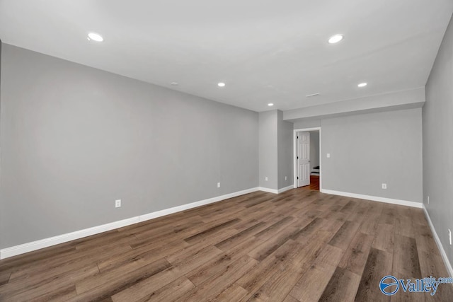 empty room featuring hardwood / wood-style floors