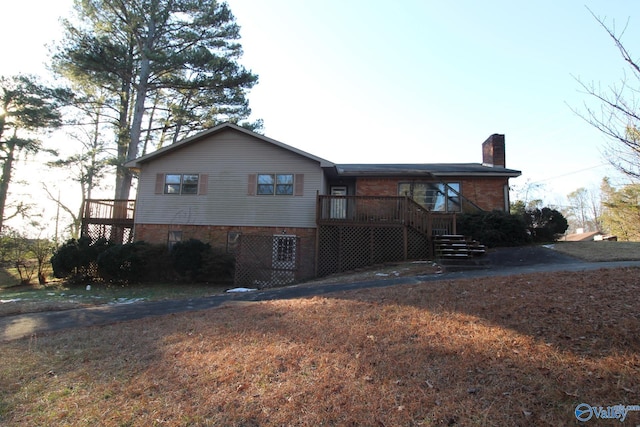 exterior space featuring a wooden deck