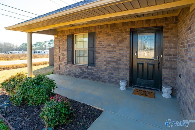 property entrance with covered porch