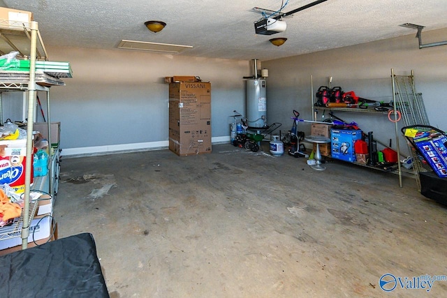 garage with gas water heater and a garage door opener