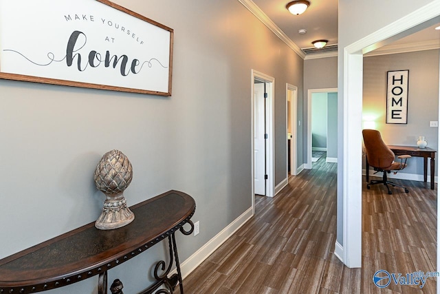 hallway featuring dark wood-type flooring and ornamental molding