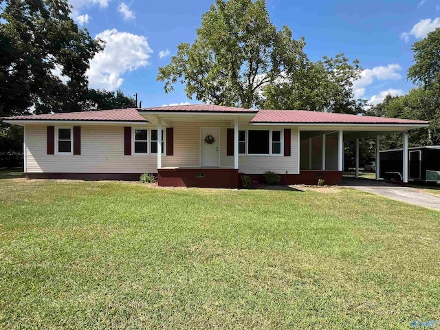 single story home with a carport and a front lawn