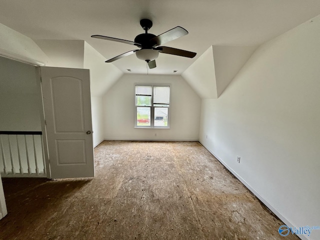 bonus room with a ceiling fan and lofted ceiling