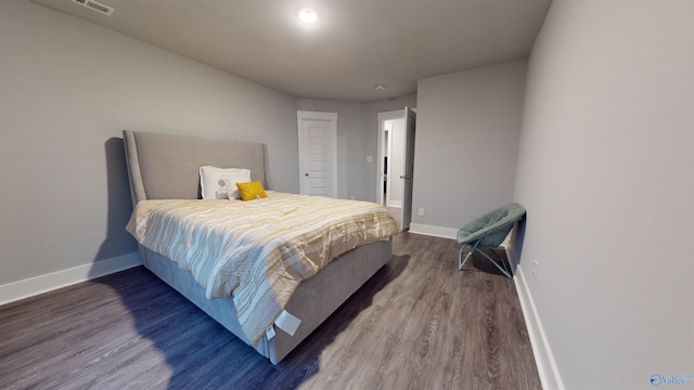 bedroom featuring hardwood / wood-style flooring