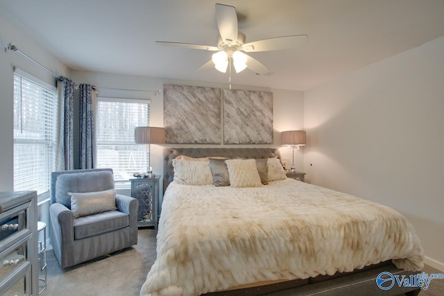 bedroom featuring ceiling fan and carpet floors