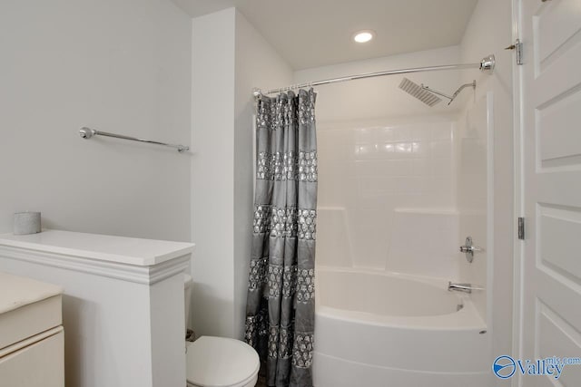 full bathroom with toilet, vanity, and shower / tub combo with curtain