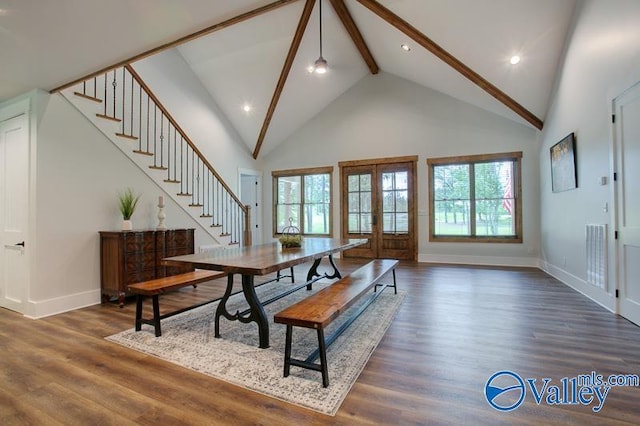 dining space with baseboards, a healthy amount of sunlight, high vaulted ceiling, and beamed ceiling