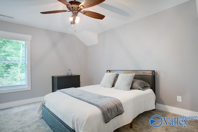 bedroom with baseboards, carpet flooring, and visible vents
