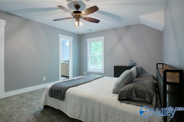 carpeted bedroom featuring connected bathroom, baseboards, and ceiling fan