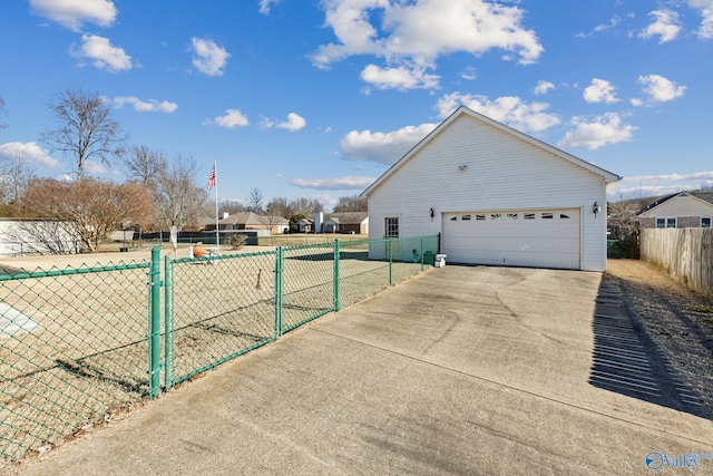 view of side of home with a garage