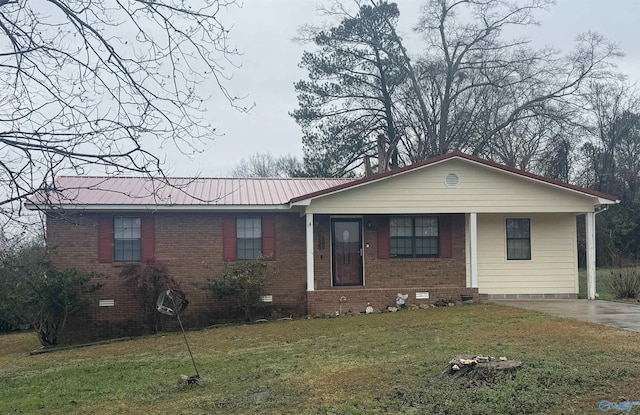 single story home featuring brick siding, crawl space, metal roof, driveway, and a front lawn