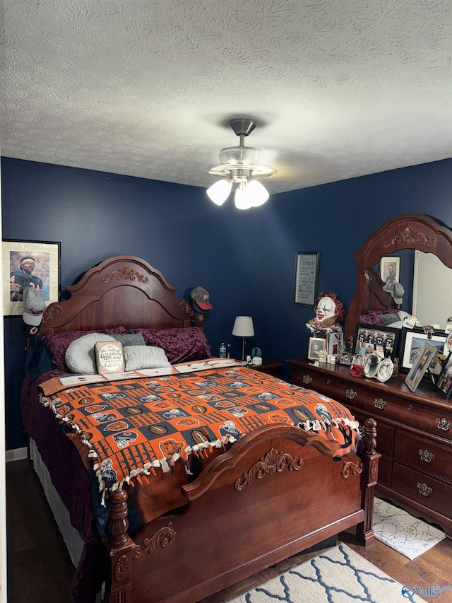 bedroom featuring a textured ceiling