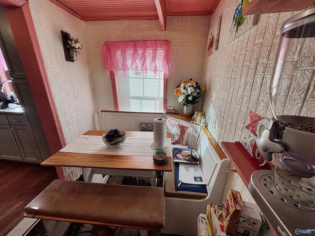 dining space featuring wood-type flooring