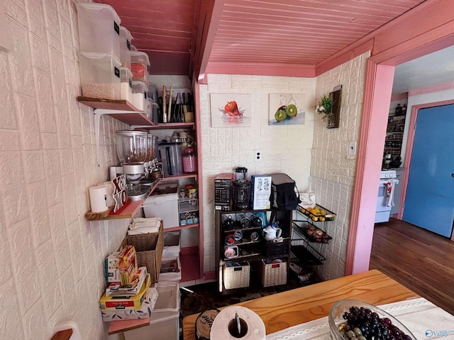 home office with wood-type flooring