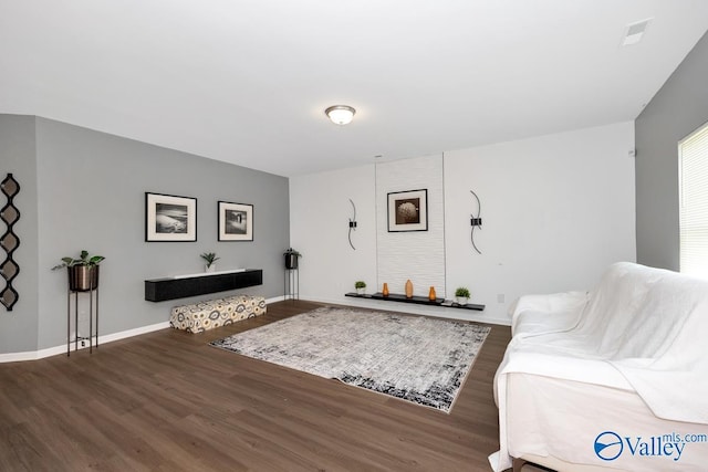 27091 Rabbit Run, Athens, AL 35613 - living area featuring wood finished floors and baseboards