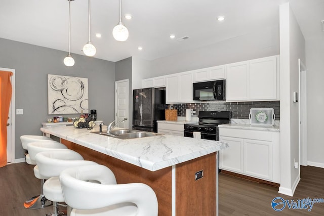 27091 Rabbit Run, Athens, AL 35613 - kitchen with black appliances, backsplash, dark wood-style floors, white cabinetry, and recessed lighting