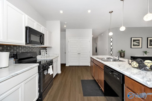 27091 Rabbit Run, Athens, AL 35613 - kitchen featuring black appliances, dark wood finished floors, tasteful backsplash, white cabinetry, and pendant lighting