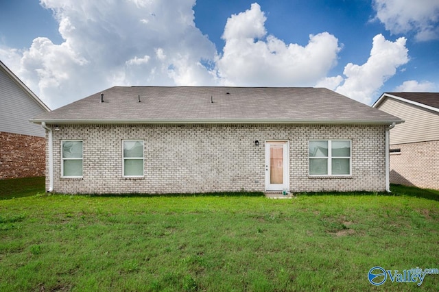 27091 Rabbit Run, Athens, AL 35613 - back of house featuring brick siding, a yard, and roof with shingles