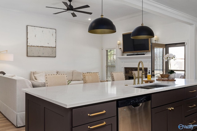 kitchen with stainless steel dishwasher, open floor plan, and ornamental molding