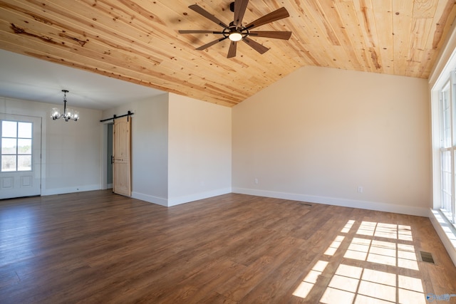 unfurnished room featuring a barn door, wood finished floors, baseboards, and wooden ceiling