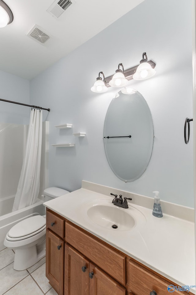 full bathroom with tile patterned floors, visible vents, toilet, and vanity