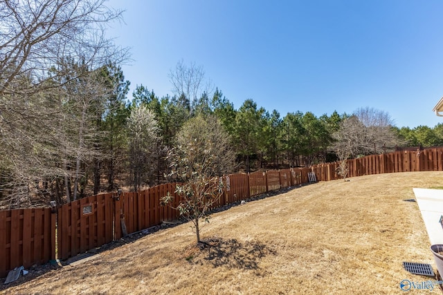 view of yard featuring a fenced backyard