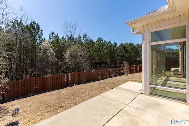 view of patio / terrace featuring fence