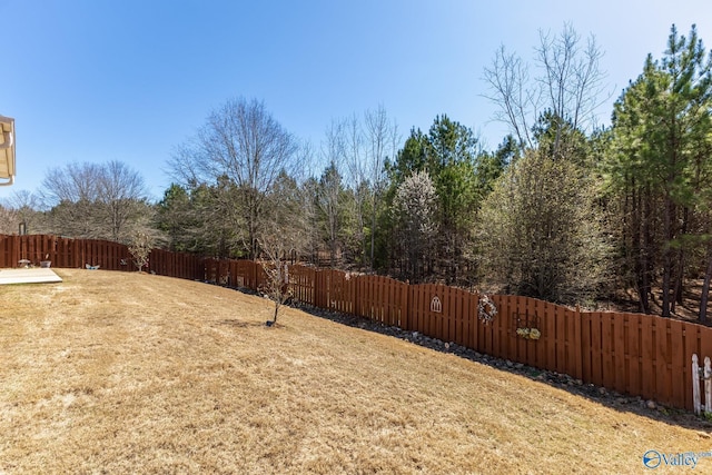 view of yard featuring a fenced backyard