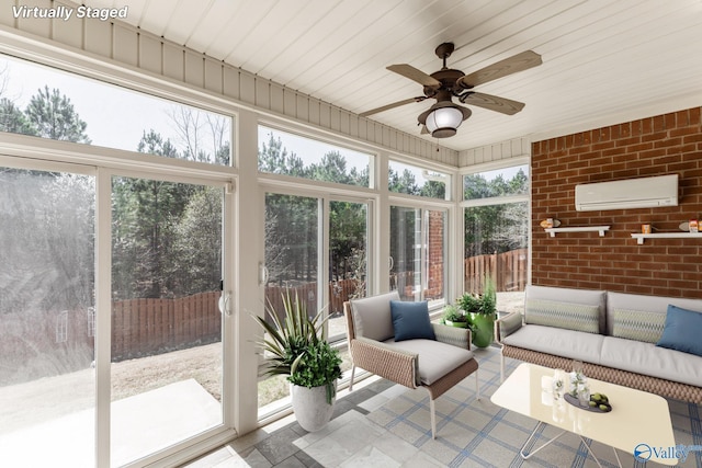 sunroom / solarium with a wall mounted AC and a ceiling fan