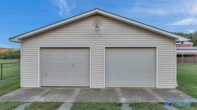 garage with a yard